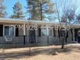 Enjoy this nicely remodeled home on deep lot with pines. 3 bedrooms with gas heat and central air. All appliances including stove, refrigerator, microwave, disposal, freezer and washer/dryer. Ceiling fans and patio. Lots of storage. Owner will provide
