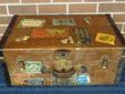 This gorgeous old suitcase dates from the early 1900's and is in wonderful condition. Based on the stickers it's been to some great places! It's made by the Warren Leather Goods Co. from Worcester, Mass. Some of the stickers have come off, but are saved
