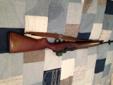 This M1A appears to have been built in the early 1980's (serial number 024XXX) by Springfield from new GI parts, considered to be some of the best shooting M1A's ever made. This is in a GI walnut stock with some sort of cartouche resembling the CMP eagle