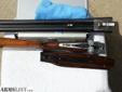Beretta Silver Hawk Featherweight side by side 12 ga shotgun, excellent condition with 30" barrels, fixed chokes,( Modified and Full) High rib with silver receiver, heavily engraved, single trigger, beavertail forend. Has some slight marks on wood from