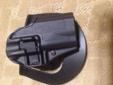 This is a hard to find Blackhawk CQC holster specifically for a Glock 30 hand gun, $30. I also have an Uncle Mikes paddle holster for a Glock 22 / 30 $30