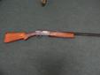 Browning semi automatic 12 GA shotgun, made in Belgium, 2 3/4 in shells only, upgraded model with scrolling on both sides of the receiver, good condition