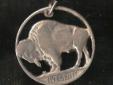 Buffalo Nickel Cut Coin Pendant One of the most famous of all American coins is the
Buffalo Nickel. It makes a great cut coin pendant
as you can see here.
Get one of these beauties for yourself or for a gift. Click on the image or on Buffalo Nickel cut
