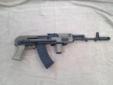 AK-74 underfolder. Bulgarian parts, numbers matching. Installed Brand New USA made; 5.45x39 4140 chrome-moly barrel, Fully Chrome-Lined, with 1-8" twist. Comes with two magazines, few extra parts for the railed forearm, and 60 rounds of ammo. Test fired