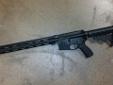 Selling one of my extra rifles to fund other interests. Never gets used and only has 200-300 rounds fired. Came as a factory complete Bushmaster XM-15, not a frankengun. It has been upgraded with a Midwest Industries 15" free float rail, a milspec buffer
