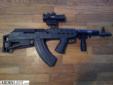 American Made Century Int Arms. Ak-47 bullpup. Hammers 2x42rd red/green optic. Sling. Foregrip, surefire taclight. 7.62x39. Not easily found. Price?? Make some offers. text @ REDACTED
Source: