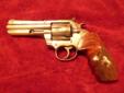 Gorgeous Colt King Cobra .357, Shiny nickel finish, 4" barrel recessed, beautiful custom Colt factory wooden grips with golden prancing Colt . From family estate.
It's been shot a little, no box.
Never seen one this pretty and these are only going rapidly