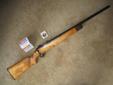 Harrington/Richardson Model 12 Customized target rifle. Copy of Winchester Model 52 bolt action single shot. Heavy 28" free floated target barrel. Customized semi sporter/target stock with beautiful burl walnut fore-end tip. Shoots extremely well - see 50