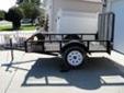 Custom utility trailer for sale; 5'x8'; duraliner applied; 2" coupler installed; tailgate removes; may use wood planking for tailgate; working pigtail with lights installed; expertly made locally; 15" wheels; weight capacity=3500 lbs. PRICE IS