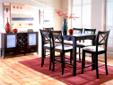 This 54" square pub set is the ideal accent for any dining room. It features a cappuccino finish, and a butterfly leaf. This five piece set includes a table, and four bar stools.
Call 681-8121!