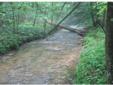 City: Ellijay
State: Ga
Price: $930000
Property Type: Land
Agent: VICTOR DOVER
Contact: 706-864-2600
WWW.VINSONDOVERREALTY.COM An incredible 4000+ feet - nearly 4/5 of a mile - of tumbling and cascading trout waters flow along and through this 62+/- acre