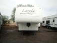 2004 KEYSTONE LAREDO
Model: 28RE
Manufactured by Keystone RV, Inc.
30 FT x 8 FT
FIFTH WHEEL TRAVEL TRAILER
**** SLIDE-OUT ****
Sleeps up to 5
Bed, Bench-Style Dinette/Sleeper, Jack-Knife Style Sofa Sleeper
Dealer Stock Number: 1557
Vehicle ID Number: