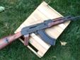 Interarms Bulgarian Milled AKM AK47 Red WoodThis is one gorgeous AK47 rifle, Heavy duty Milled receiver, made with a 1960 AK47 Bulgarian part kit and beautiful red wood stock set. It is a semi-auto rifle in 7.62x39 caliber. They are built as a dependable