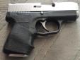 Kahr cm9 sub compact with polished and throated barrel. Runs perfectly. Great carry gun. The trigger has a long pull but it is the smoothest D/A trigger I've ever felt. Little scratch on the slide (see pics).
Comes with a Galco Miami Classic II shoulder