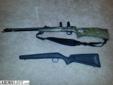 Knight Wolverine with camo thunk hole stock and a black standard stock. It hs the 209 shotgun primer system conversion and it also come with scope rings. I am also including some TC Sabots and the Red Primer adapters.
Source:
