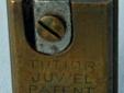 The top of this vinatge pencil sharpener is stamped - L & C Hardtmuth. The back is stamped - Tutior Juwel Patent Made in Germany. It has two blades both of which are sharp and in good condition. It comes complete with the original leather case. The press
