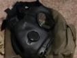 Military gas mask with carry pouch. Includes filters. Good condition. 25.00