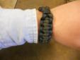 Handcrafted by famed designer Zachary Morissette, these paracord braclets must be seen to be believed! This model comes in the classic olive drab green and black paracords, handwoven with a polymer buckle.