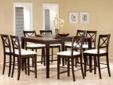 The Cappuccino Counter Height Dining Set from Coaster offers style, functionality, and beauty all in one! Each of the four (4) chairs feature fabric cushioned seats in white with a subtle satin-like pattern. The 18"W butterfly leaf is another great