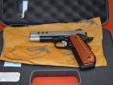 Three months Used Preowned Smith & Wesson 1911 PC 45 ACP with 4.25"bbl. CUSTOM SW1911 ROUND BUTT - PERFORMANCE CENTER ?SA ?Scandium alloy frame ?SS slide ?Black post front sight ?Fixed rear sight ?Two-Tone finish ?G10 custom wood grips ?Bobtail frame