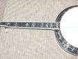 I have a new Recording King RK-R85 Soloist 5 string banjo that listed for $1899.99. The banjo is new old stock (it has just been in its case since I ordered it from TML and set it up). The banjo has a maple neck and resonator, 3 ply rim, "prewar" style