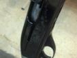Remington 1100 12 g 28" modified barrel.
2 3/4 only.
with +5 magazine extinction.10 round total.
Blueing is very nice.
Stocks are painted to dark earth..
Has a combat charging handle.
Source:
