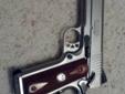 Ruger sr1911 commander size (4.25" bbl) a little over 100 rounds through it and have put 50 fmjs and 50 assorted hollowpoints through with 0 malfunctions (so much for a break in period) has Wilson combat ambi safety. comes with an 8 rd Wilson 47d mag and