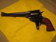 RUGER 'NEW MODEL' SUPER BLACKHAWK .44 MAGNUM SINGLE ACTION REVOLVER
IN BEAUTIFUL, LIKE NEW CONDITION WITH ORIGINAL BOX
7 1/2 In. BARREL NO TRADES