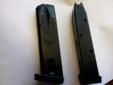 Two Sig Sauer P226 9mm 15 round magazines with padded butt plate. $60.00 for both.obo