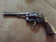 1947 22lr 6 shot revolver. Gun shows holster wear, scratches, nicks. Just normal wear and tear on a 60 year old gun. It shoots very well. Heavy. Solid gun. All original including the matching number grips. I just don' t shoot it much anymore. Asking $500