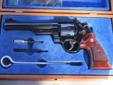 SMITH AND WESSON MODEL 25-2 IN 45 ACP HAS 6 1/2 INCH BARREL. EXCELLENT CONDITION. $950 OBO. COMES WITH FACTORY DISPLAY WOOD BOX AND (6) 45 ACP MOON CLIPS. CALL 928-925-583ONE