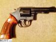 I have a beautiful 1963 model year S&W Mod 10-6 .38 Special CTG revolver with 4" heavy barrel and square butt wooden grips. This weapon comes with it's original box, wrapping, warranty card, and is in EXCELLENT condition- 99% This has been sitting in a