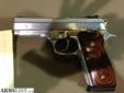Taurus PT945, .45, Stainless Steel w/ gold accents. David REDACTED
Source: http://www.armslist.com/posts/1112603/yuma-arizona-handguns-for-sale--taurus-pt945-