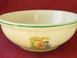 Vintage Warwick child's cereal bowl. It is made of heavy pottery (restaurant type) and is in very good condition, no chips or cracks. It is decorated with three different scenes of children around the side. It measures about 5 3/4" in diameter and 2 1/4"